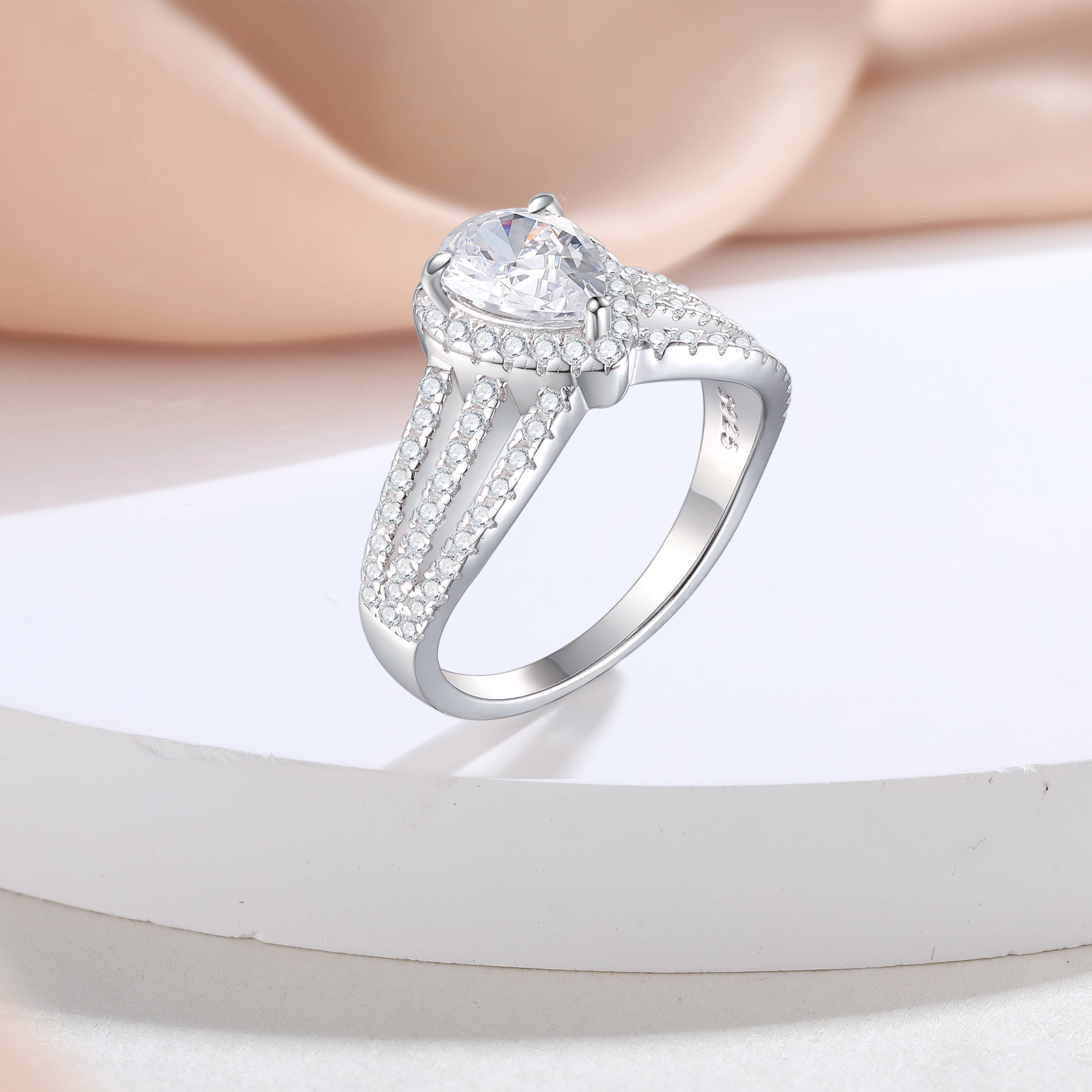 925 Sterling Silver Cz Pear Cut Halo with Triple Row Cz Band Ladies Ring