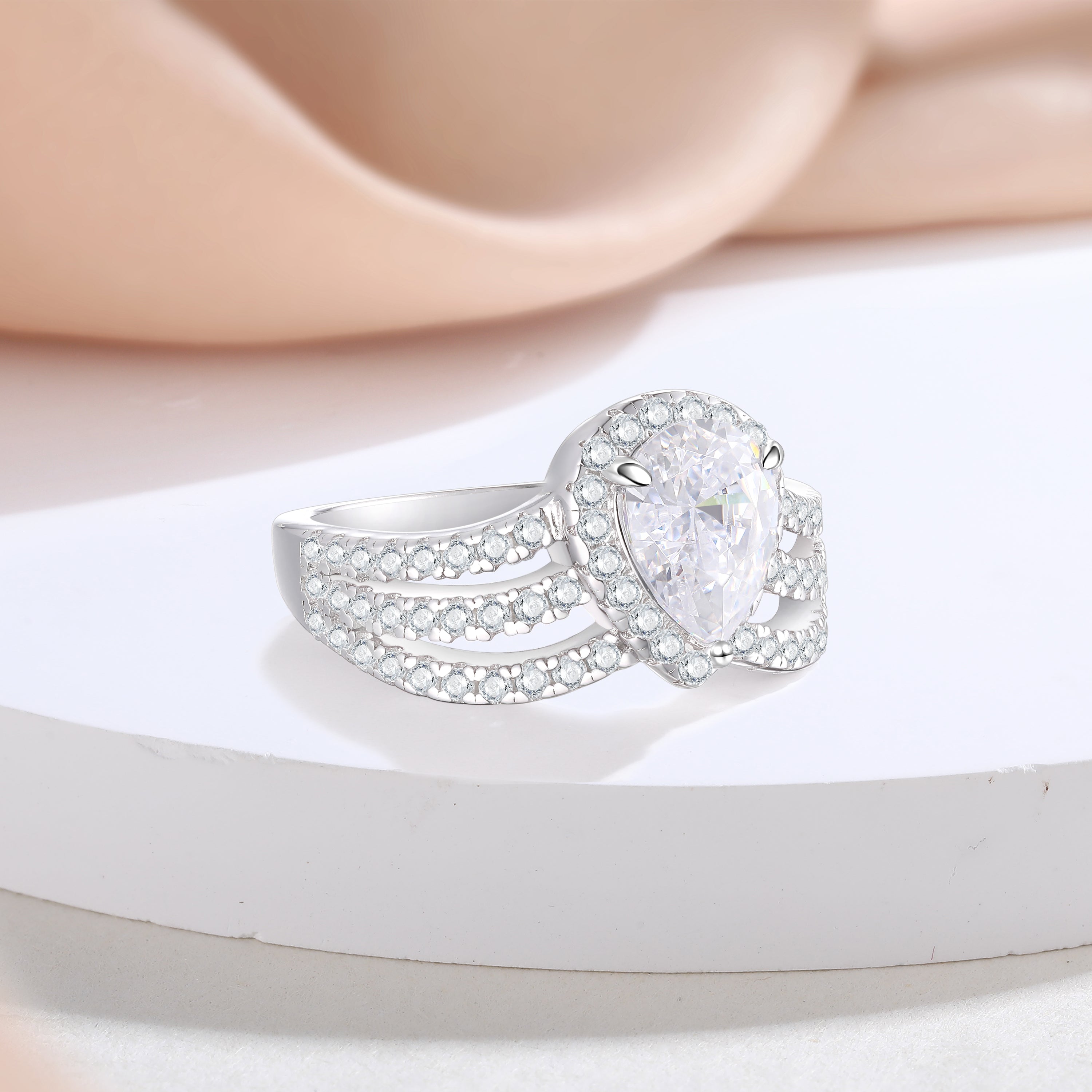 925 Sterling Silver Cz Pear Cut Halo with Triple Row Cz Band Ladies Ring